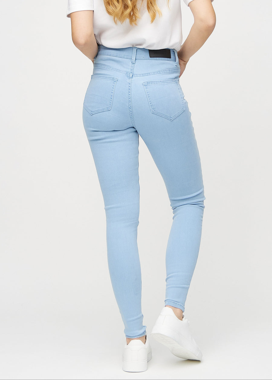 Lyseblå skinny jeans set bagfra, så man kan se hele produktet.