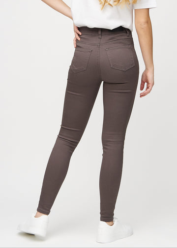 Gråbrune skinny jeans set bagfra, så man kan se hele produktet.