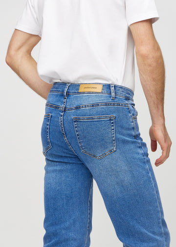 Denim regular jeans set bagfra tæt på for at vise detaljer.